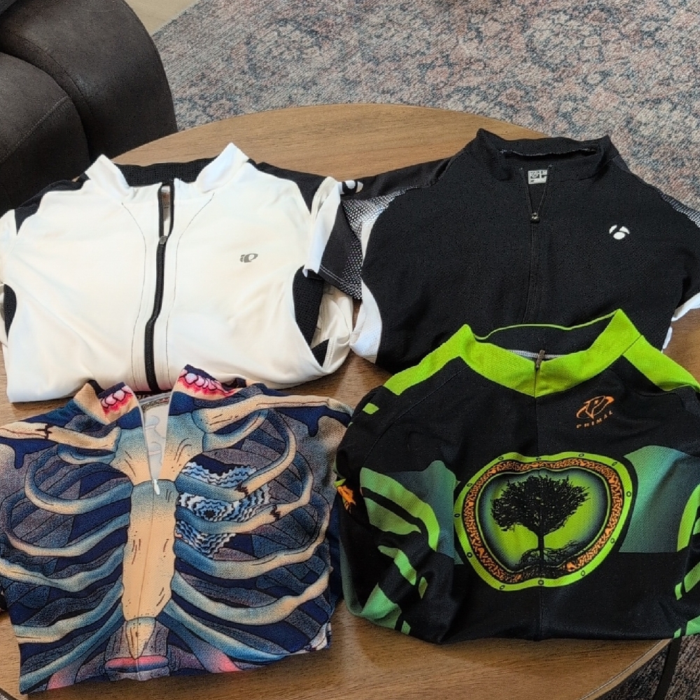Lot Of 4 Cycling jersies-